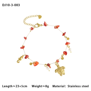 Detail of stainless steel anklet with colorful coral beads, sea turtle and seahorse charms