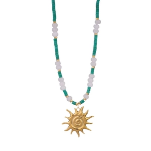 Beaded stainless steel necklace with green stones and gold sun pendant for women