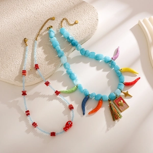 Colorful natural stone beaded necklace with chili pendants and golden heart charms
