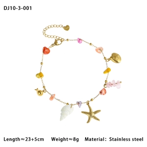 Detail view of stainless steel anklet with colorful natural stones and sea charms