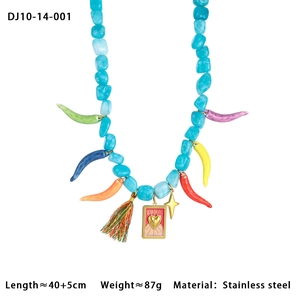 Detail of bohemian stone beaded necklace with colorful chili charms and stainless steel pendant