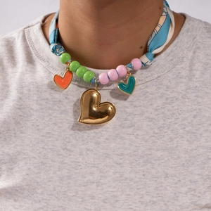 Colorful silk scarf necklace with beaded accents and multiple gold heart pendants