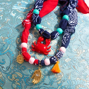 Bohemian silk scarf necklace with crab pendant, Hamsa hand, and colorful beads