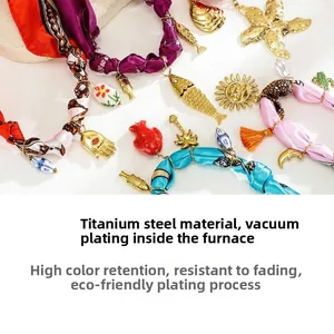 Detailed macro view of colorful silk necklace pendants with durable vacuum gold plating