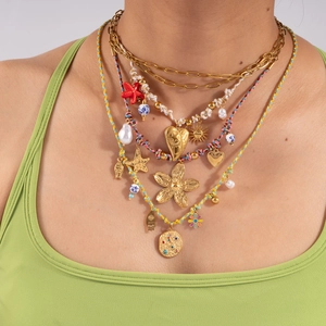 Collier Superposé en Acier Inoxydable Bohème pour Femme Corde Tissée Pendentif Cœur Fleur Étoile de Mer Main de Fatma Bijoux