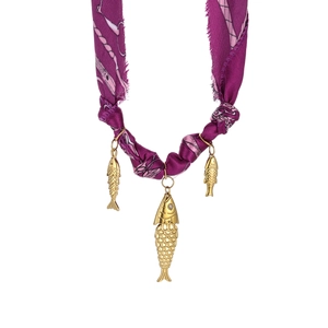 Detail of purple silk cord necklace with three gold-tone engraved fish charms and rhinestones
