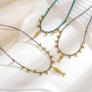 Bohemian beaded necklaces with natural stone and carved fish charms in a set of three