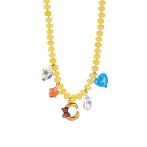 Detail of beaded necklace with yellow beads, C-letter bear, heart and flower charms