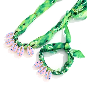 Bohemian beach style necklace and bracelet set with green fabric and shell pendants
