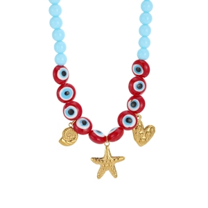 Detail of beaded necklace with evil eye charms and golden seashell and starfish pendants