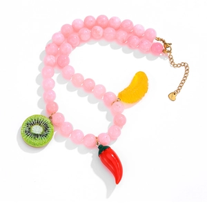 Pink beaded necklace with kiwi orange and chili pendants in romantic beach style