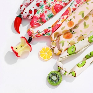Colorful fruit print scarf necklaces with resin charms like strawberry and kiwi