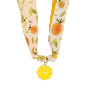 Macro shot of fabric scarf necklace with orange print and yellow lemon slice pendant