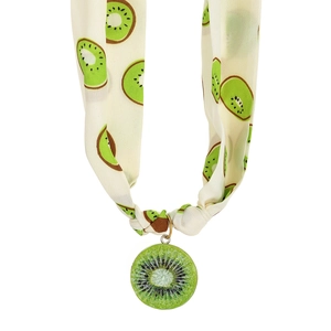Chic kiwi fruit patterned fabric scarf necklace with a round charm on white background