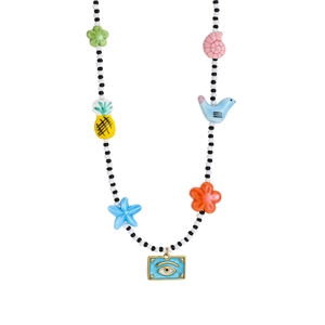 Colorful beaded necklace with white and black seed beads and cartoon charms on white background