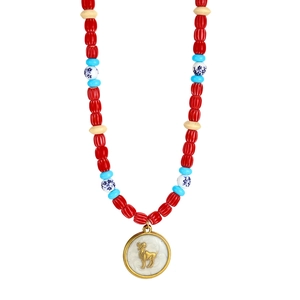Detail of colorful beads and golden pendant with goat zodiac relief on steel necklace