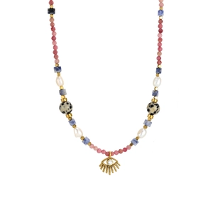 Detail of beaded bohemian necklace featuring pink faceted stones and gold eye pendant