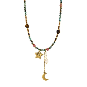 Detail of beaded necklace with turquoise, pearl, golden star and moon charms