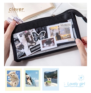 Detail of black canvas pencil case with transparent window and cute pet stickers