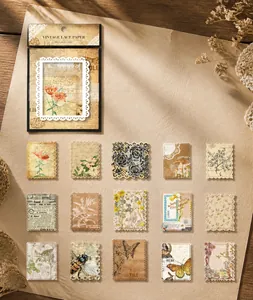 Vue macro d'autocollants en dentelle vintage aux motifs de papillons et fleurs pour scrapbooking