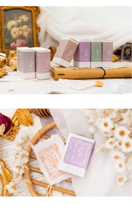 Detailed close-up of retro floral seal stickers with embossed foil and Morandi tones
