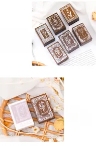 Macro shot of vintage wooden floral stamps set for scrapbooking with gift packaging