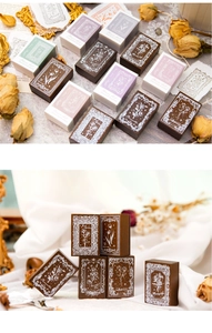 Detailed view of vintage floral wooden stamps with intricate botanical engravings
