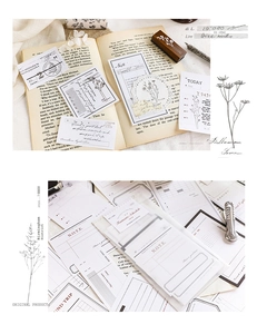 Detailed view of vintage notepad paper with botanical sketches for journaling and planning