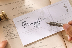 Vintage memo cards with floral line art and postmarks on a textured paper background