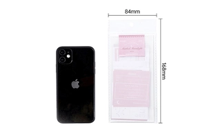 Detail showing the 84mm x 168mm size of the pink dreamlike DIY stationery paper set