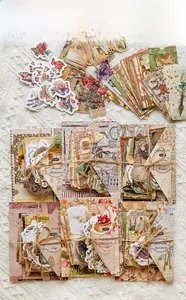 Flat lay of vintage PET stickers with floral motifs and twine for journal scrapbooking