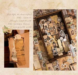 Macro detail of vintage PET stickers featuring antique clocks, keys, and old paper labels