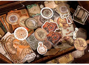 Macro shot of vintage astronomical PET stickers with sun, moon, and compass designs