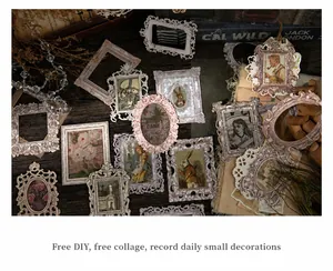 Detailed view of vintage Baroque style DIY frame stickers on a rustic wood background