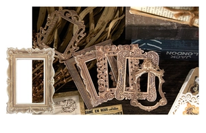 Close-up of vintage European embossed frame stickers for scrapbooking and artistic collage