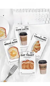 Detailed view of bread and coffee shaped sticky notes in watercolor style for stationery