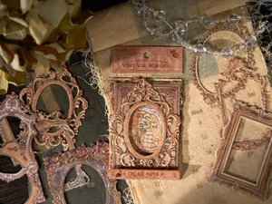 Detail of vintage embossed frame collage papers for scrapbooking with floral hollow design