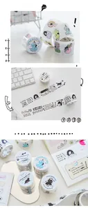 Close-up of black cat themed washi tape rolls for creative journaling and scrapbooking