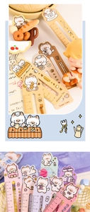 Detailed close-up of cute cartoon cat-themed bookmarks with 5cm scales and vibrant illustrations