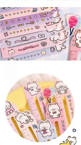 Detail of cute cat bookmark rulers featuring cartoon illustrations and metric scale