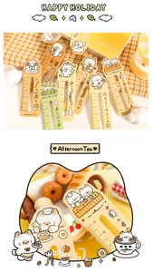 Detailed close-up of cute cartoon cat bookmark rulers with 0-5cm measuring scale