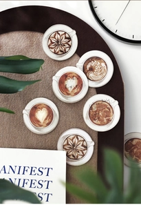 Close-up of coffee-themed latte art stickers and To Do List planner stationery
