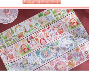 Dettaglio di nastro washi con graziosi orsetti, coniglietti e motivi per decorare l'agenda