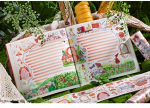 Dettaglio di nastro washi con coniglio e lamina d'oro per decorazione di agende