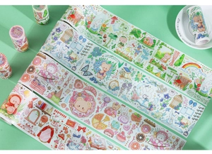Dettaglio di nastro washi con disegni a cartoni animati e accenti in lamina d'oro