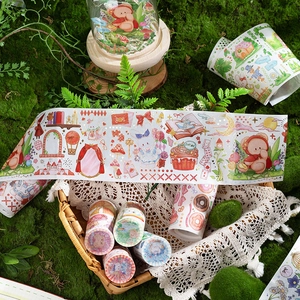 Set di nastri washi pastello con illustrazioni di conigli e orsi in una scena di bosco