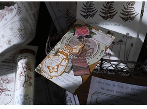 Gros plan d'autocollants vintage papillon et fleurs pour le scrapbooking créatif