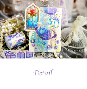 Dettaglio del nastro washi Twilight Starlight e adesivi in lamina d'oro per scrapbooking