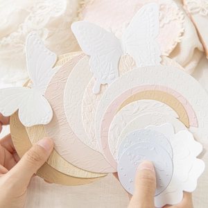 Relief paper stickers for scrapbooking featuring embossed floral and butterfly shapes