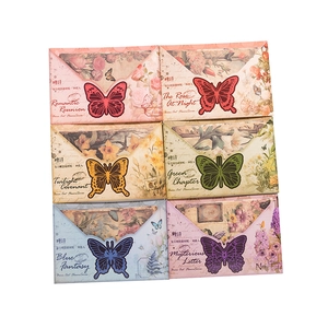 Vintage burnt-edge scrapbooking paper with butterflies and floral motifs, 30 sheets pack